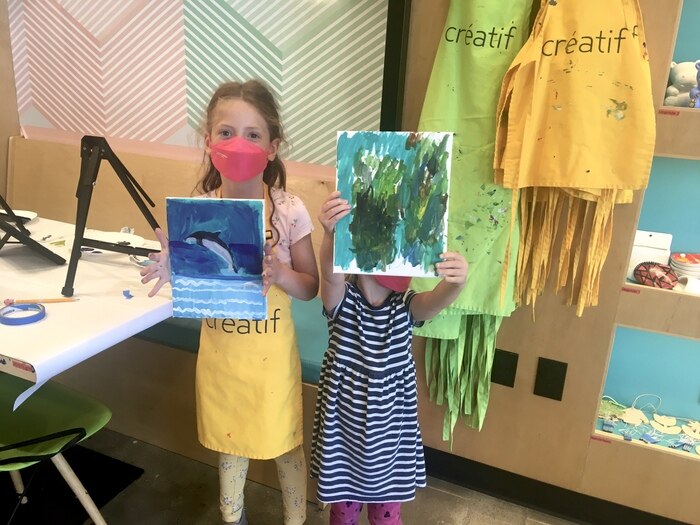 Children with artwork