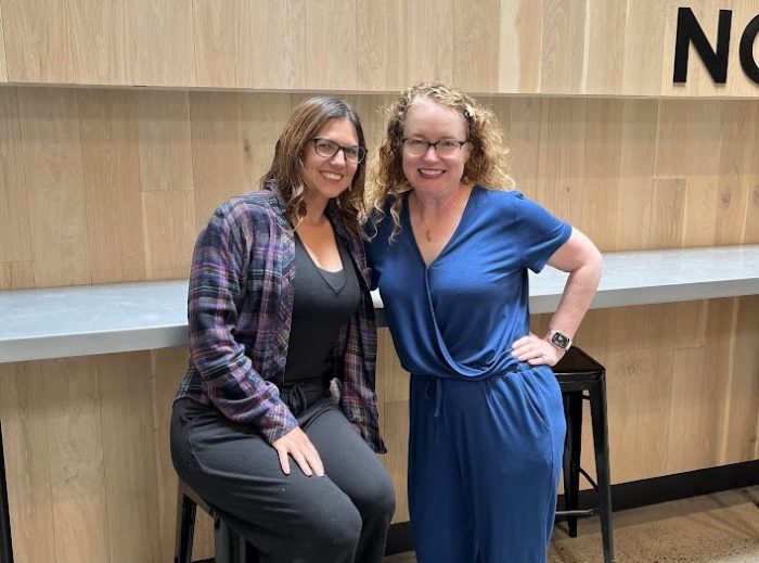 Giant Thanks to Our 2022 Sponsors 1 two women at public market standing and leaning