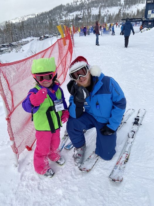 Child and skiing instructor at Sugar Bowl Resort skiing lessons
