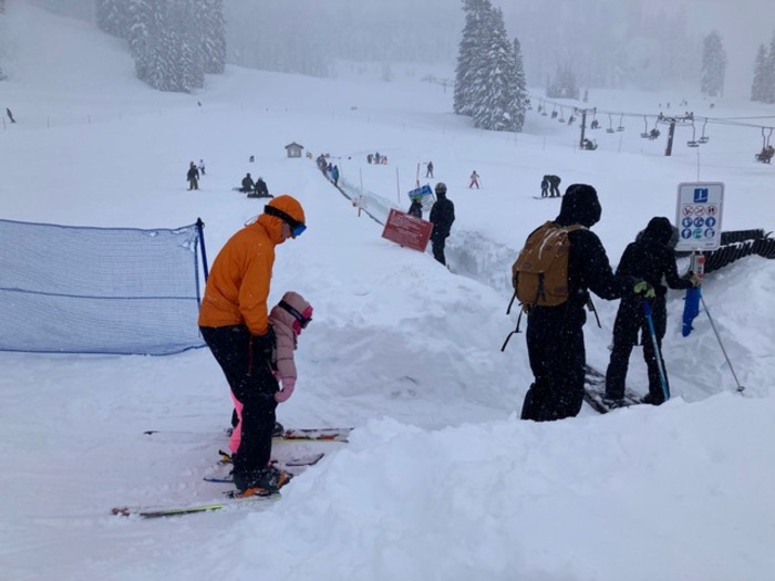 Skiers use magic carpet at Bear Valley Resort