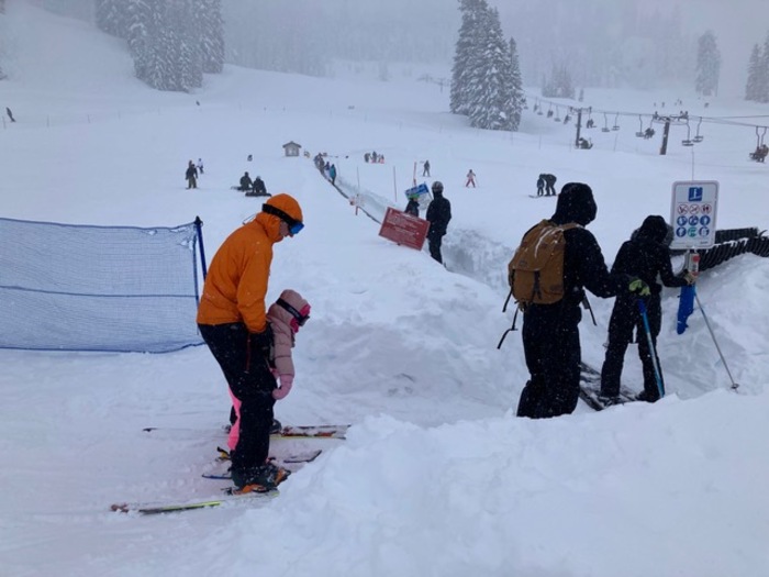 Bear Valley Ski Resort: Family-friendly Skiing and Snowboarding 2 Skiers use magic carpet at Bear Valley Resort