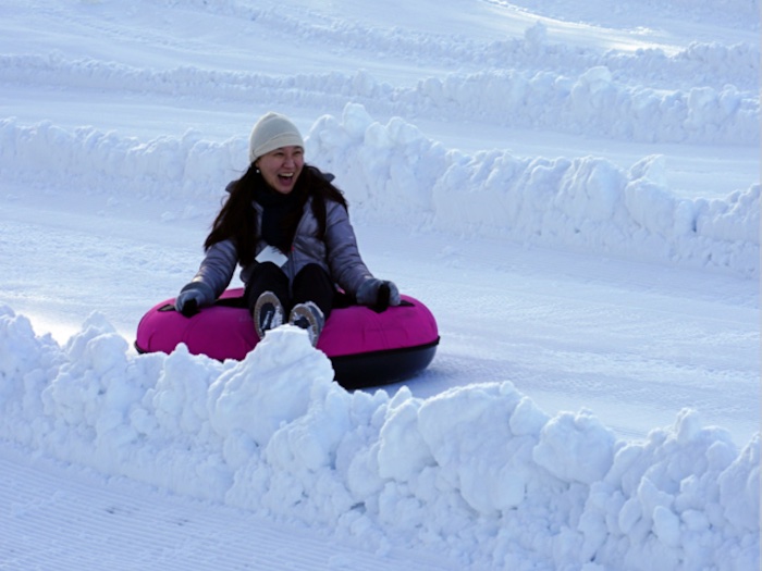 Woman on snow tube in Lake Tahoe area
