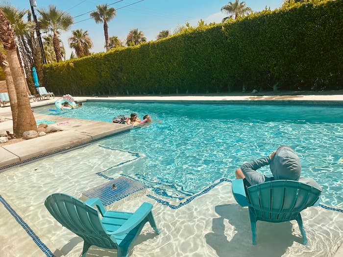 pool with person sitting in chair