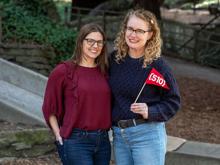 Whitney and Heather at Codornices Park in Berkeley in front of concrete slide
