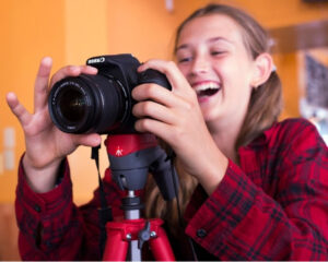 teen with a dlsr camera dslr