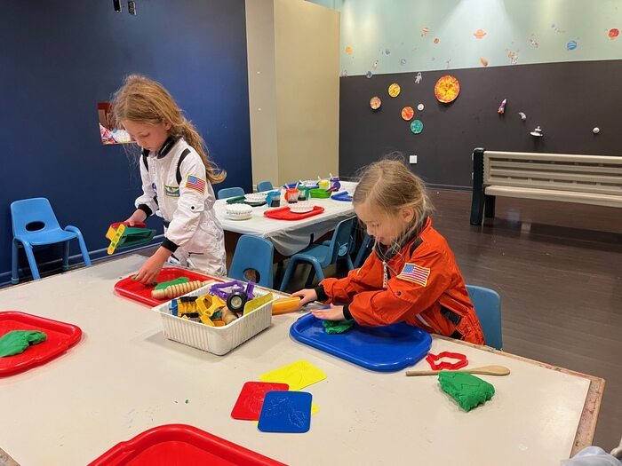 Children playing with play dough