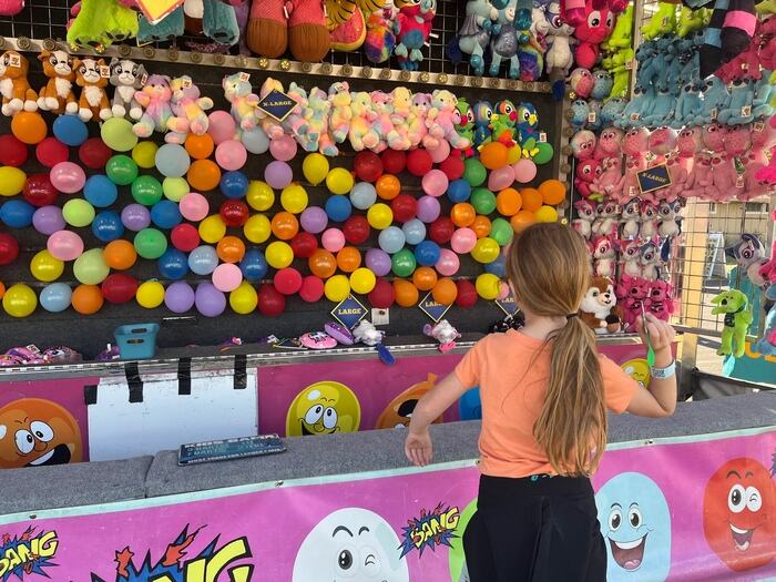 Child at carnival game