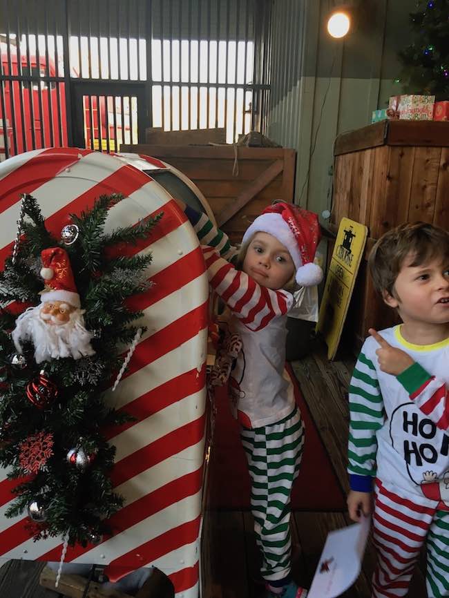 Write a letter to Santa on the Polar Express Old Sacramento kids mailing letters to santa in xmas jammies