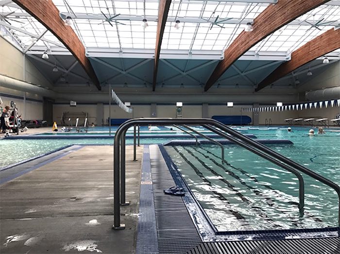 swimming pool entrance with many lanes and depths for family swim