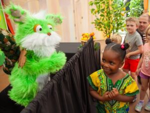magic kitchen puppet and child interacting
