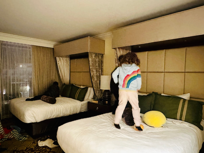kids jumping on beds
