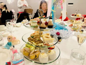tea sandwiches on tiered plate