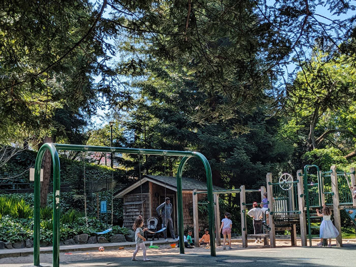 child playing on play structure