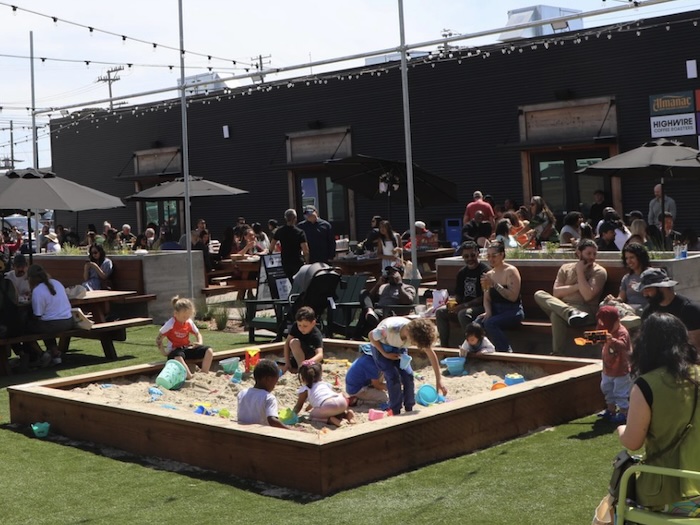 Prescott Market food hall outside courtyard includes a play area with sandbox