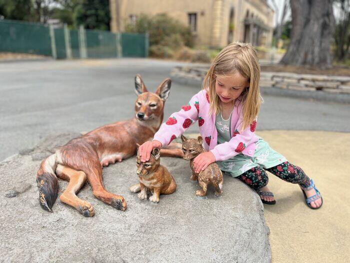 SF Zoo child with fox sculpture