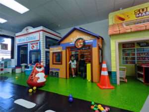 child in pretend building