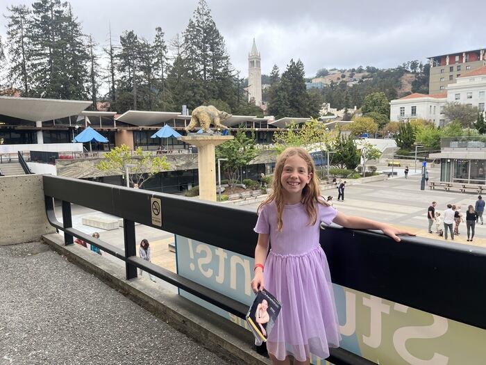 Child on balcony at Zellerbach Hall after theatre performance