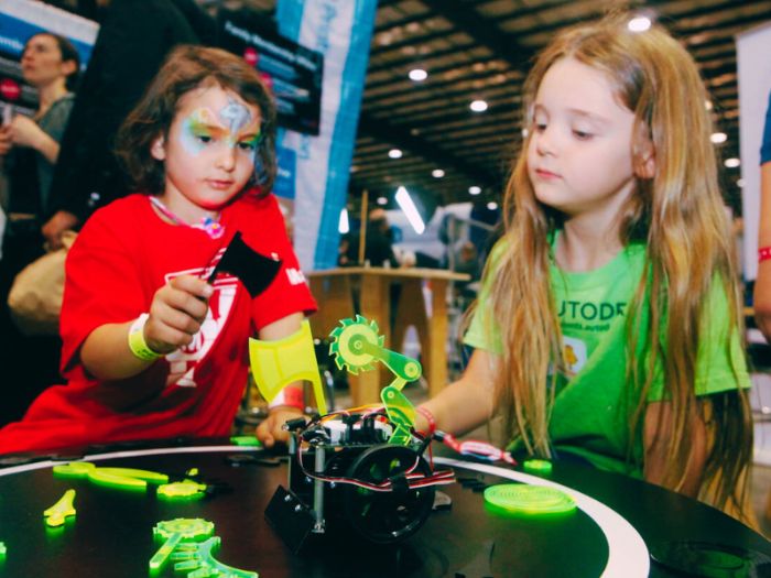 kids at maker faire at mare island building