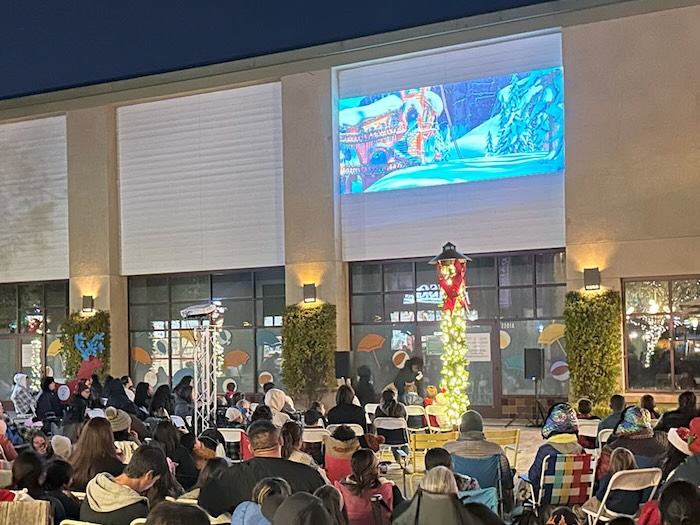 watch holiday and christmas movies together outdoors this wintertime