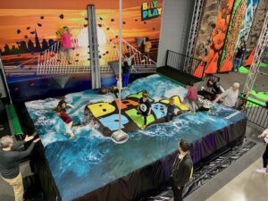 giant air pillow with climbing features on the wall at bay play children and adults