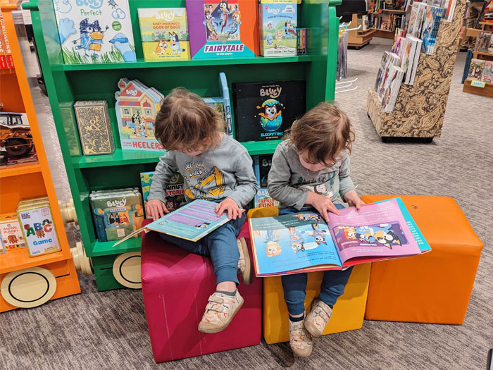Kids reading books at the book store