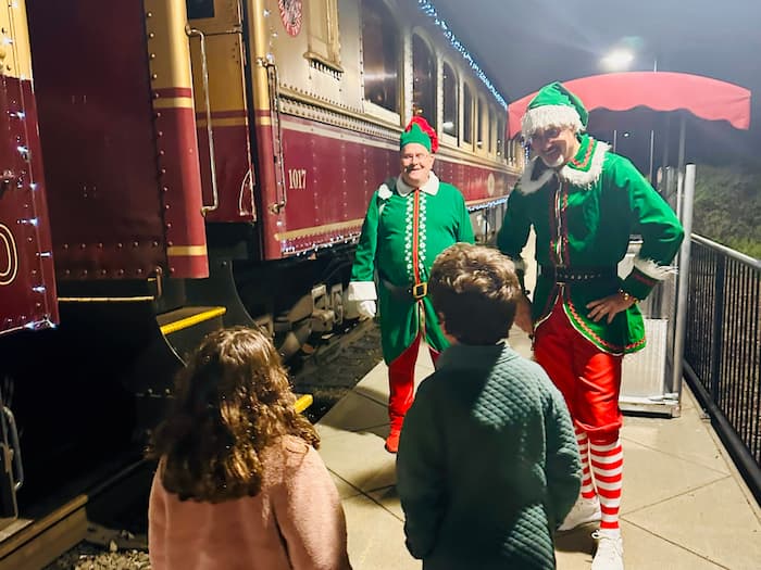 santa's elves and kids by train