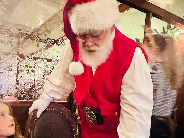 santa talking to a little girl