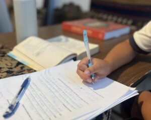 Student practicing writing