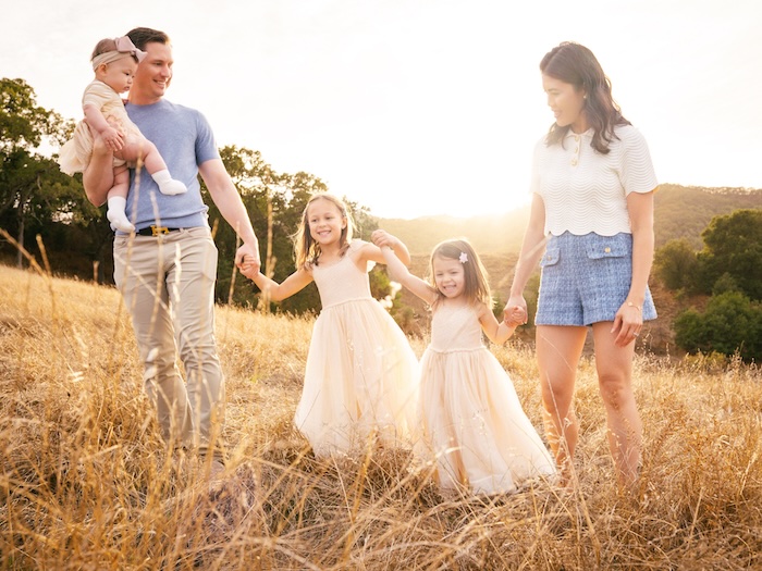 family in a sunlit field