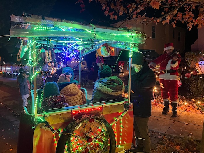 California Pedicab tours Alameda's Christmas Tree Lane