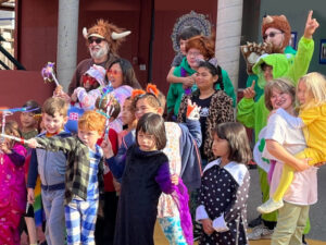 Monkey business summer camp photo with counselors, youth leaders, and campers in costume