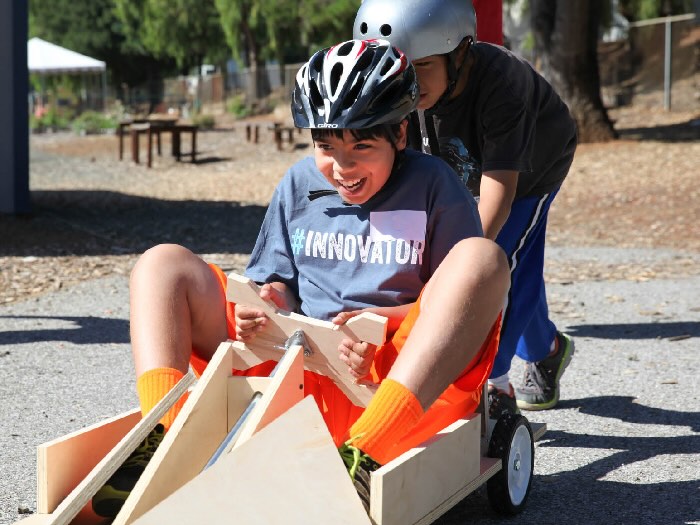 camper in a hand made go kart testing stem concepts