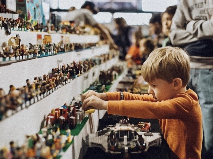 lego brick blast kid browsing lego figures and accessories