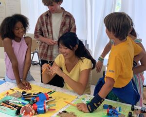 kids doing steam art projects together